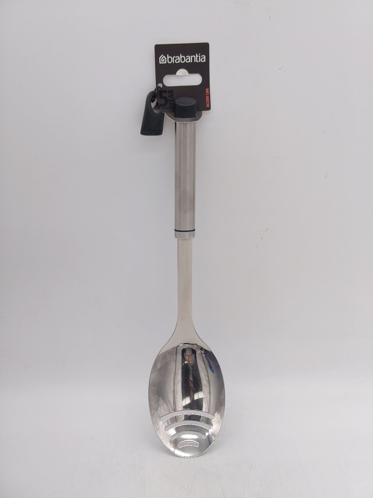 Brabantia metal serving spoon with holes