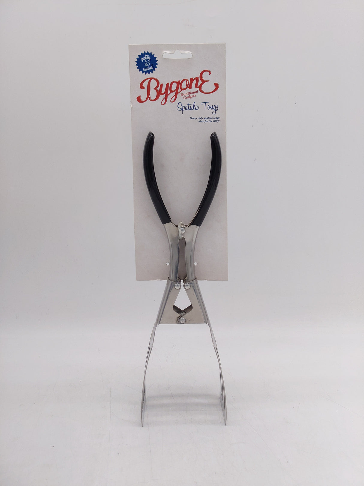 Bygone spatula tongs