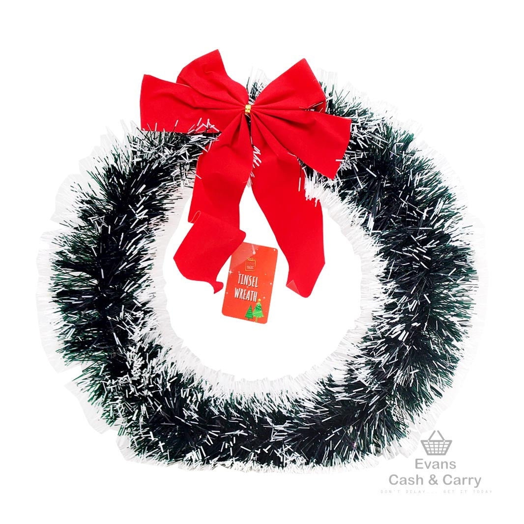 White & Green Tinsel Wreath With Red Bow